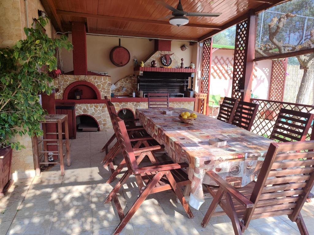 A seating area at George's family friendly maisonette with great exterior