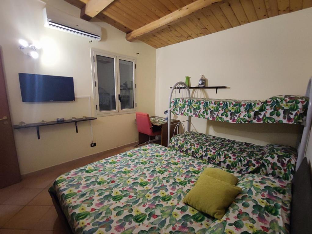 Łóżko lub łóżka w pokoju w obiekcie villa Fuga