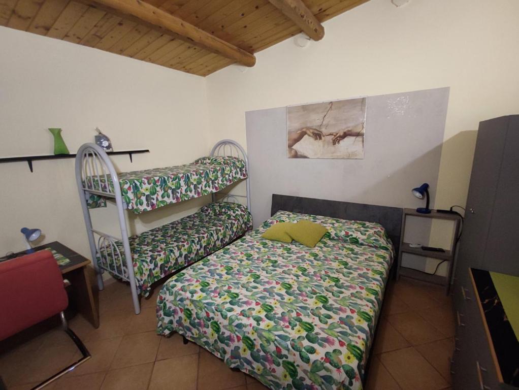 Łóżko lub łóżka w pokoju w obiekcie villa Fuga