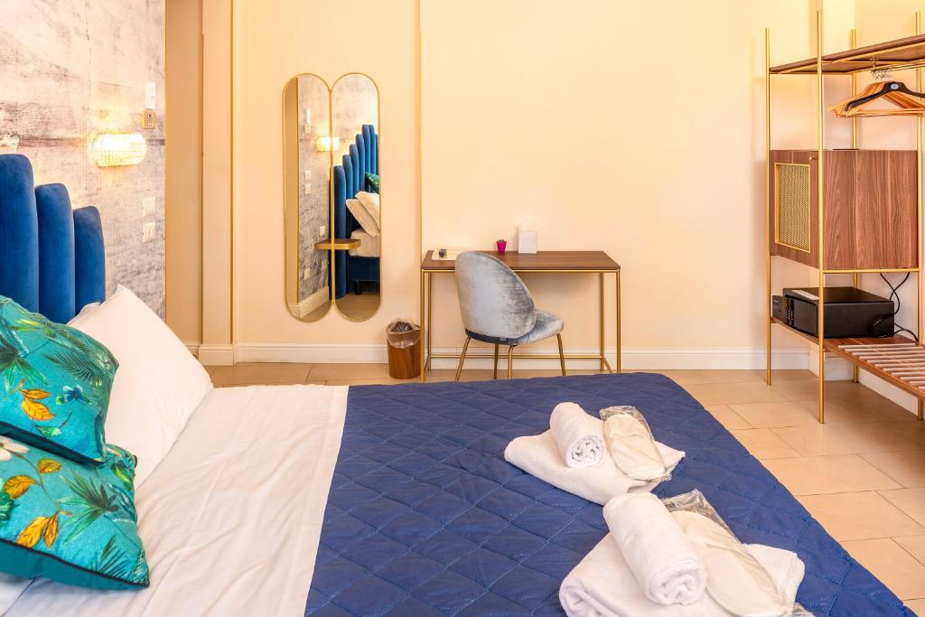 Postel nebo postele na pokoji v ubytování I Tre Re Rooms