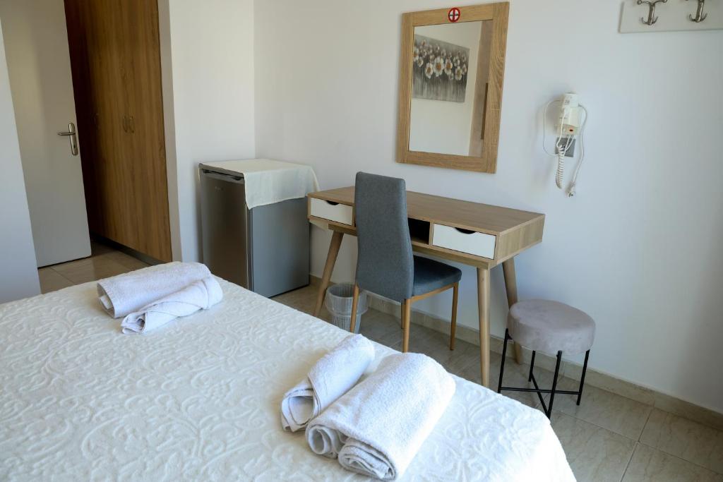 Postel nebo postele na pokoji v ubytování Marie Hotel
