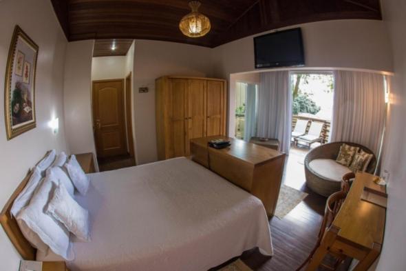 Postel nebo postele na pokoji v ubytování Hotel Itagy