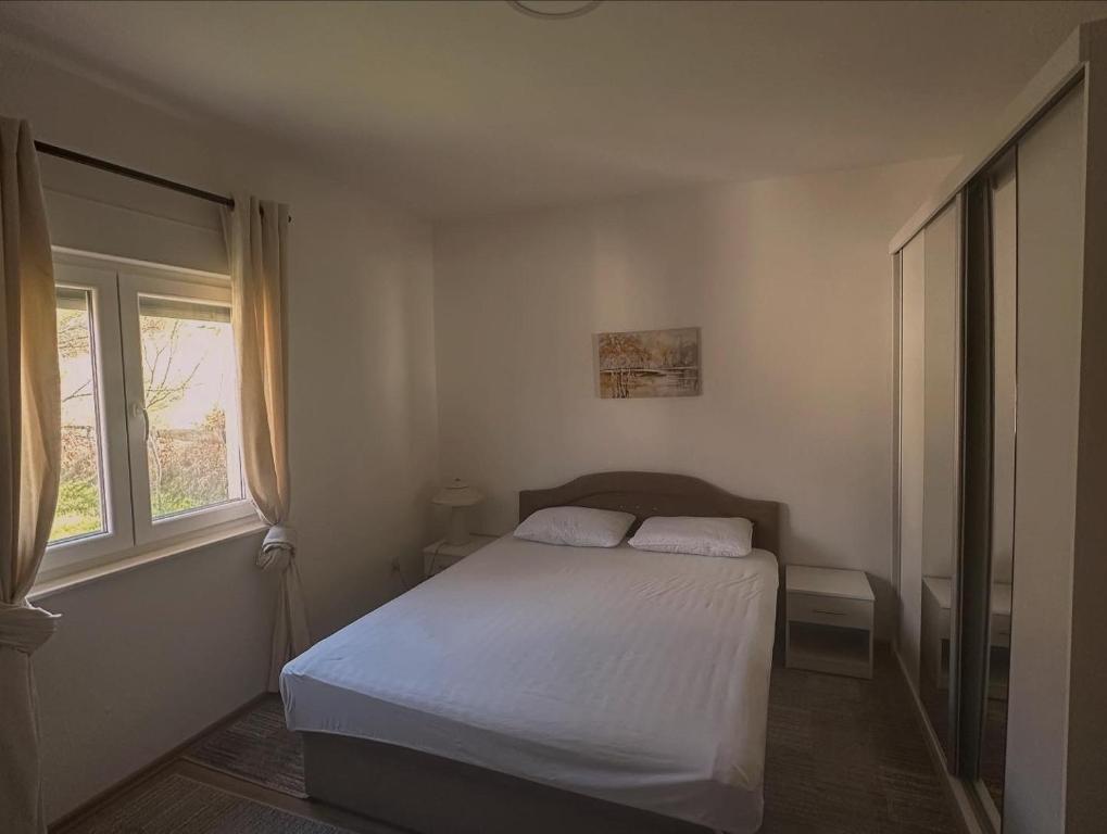 Una cama o camas en una habitación de Villa Ramea