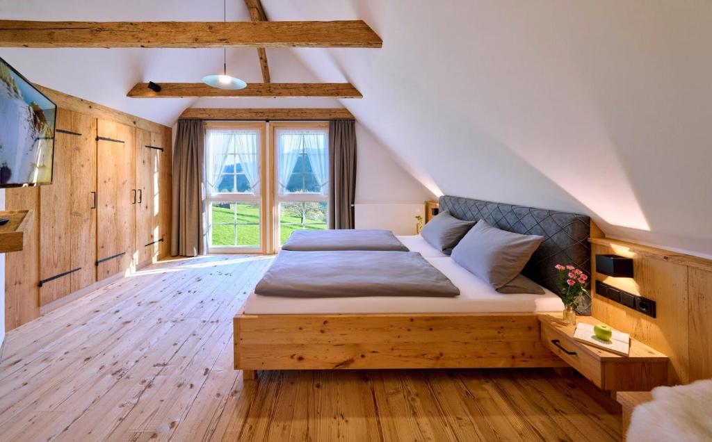 Postel nebo postele na pokoji v ubytování Blumbauernhof