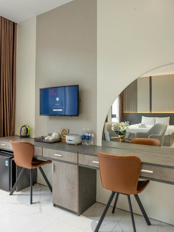 TV a/nebo společenská místnost v ubytování RAINBOW Motel