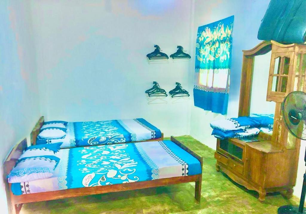 Postel nebo postele na pokoji v ubytování Chavo Gest House
