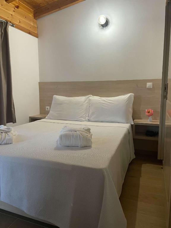 Letto o letti in una camera di Milos Apartments