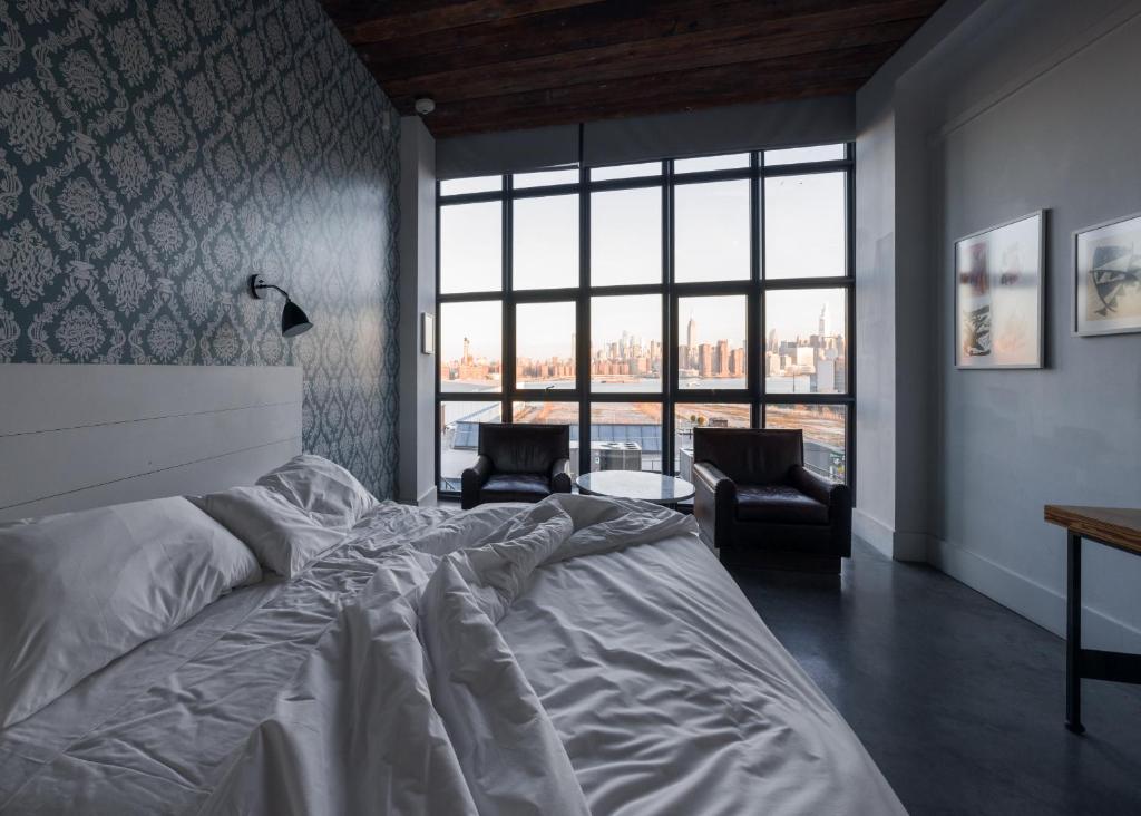 Postel nebo postele na pokoji v ubytování Wythe Hotel
