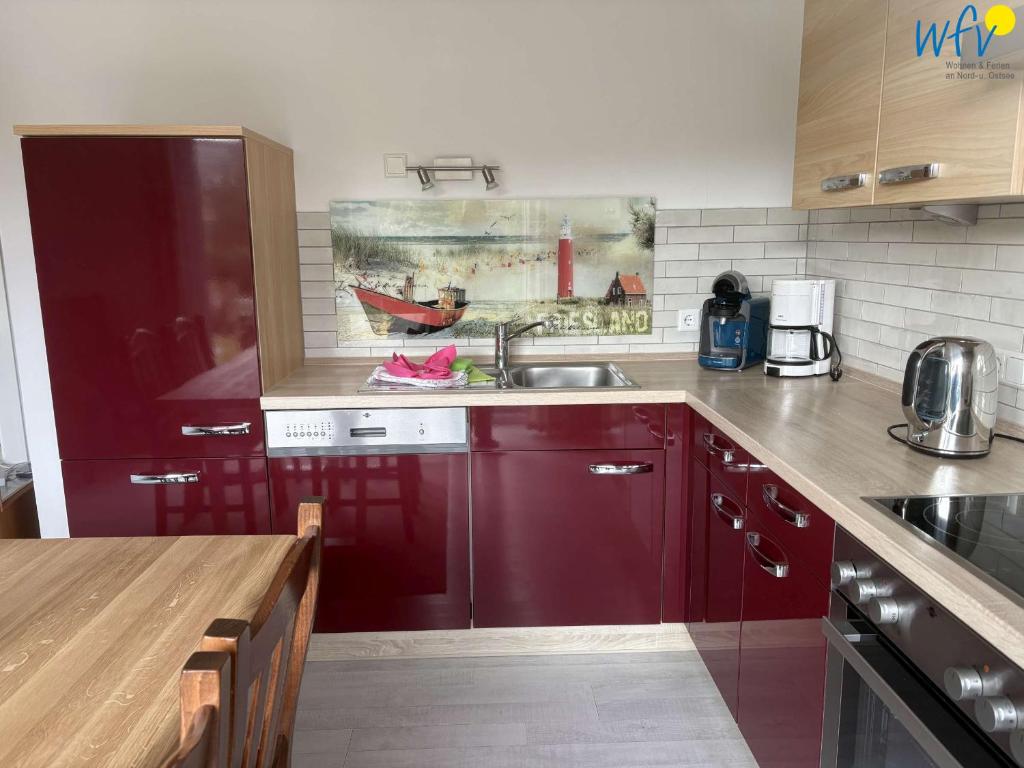 Kuchyň nebo kuchyňský kout v ubytování Villa Düna Ferienwohnung 5