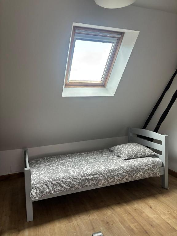 Postel nebo postele na pokoji v ubytování Gite De Malvoue