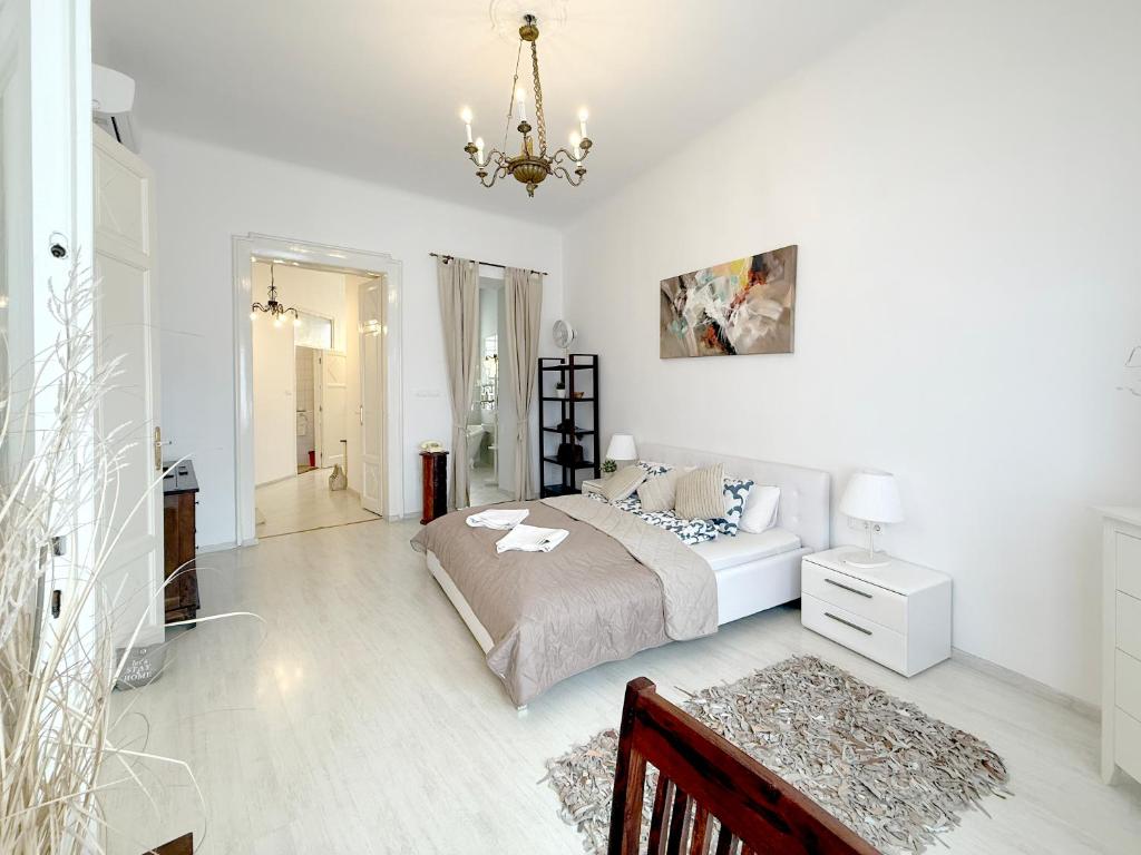 Posteľ alebo postele v izbe v ubytovaní Elegant 125m2 apartment in center of Budapest