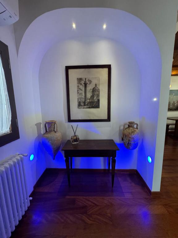 Area soggiorno di Domus Colosseum, detached house just few steps from the Colosseum