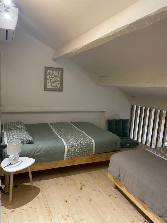 En eller flere senge i et værelse på Mazet de la calanque CAVALAIRE