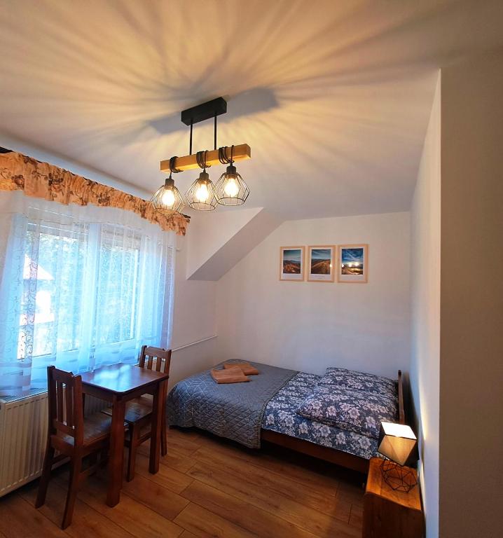 Postel nebo postele na pokoji v ubytování Wichrowe Wzgórza