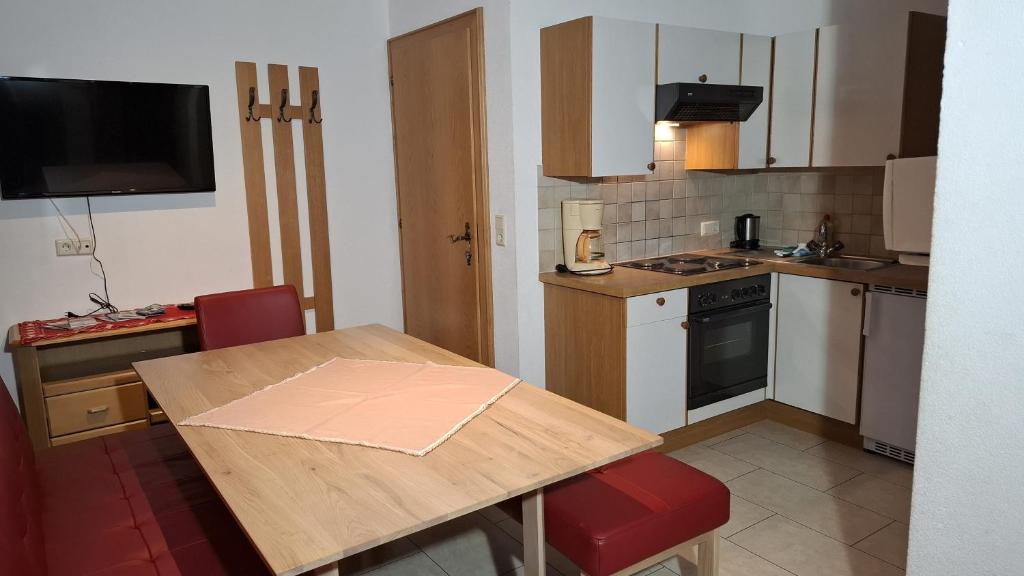 Kuchyň nebo kuchyňský kout v ubytování s´Waldhaus