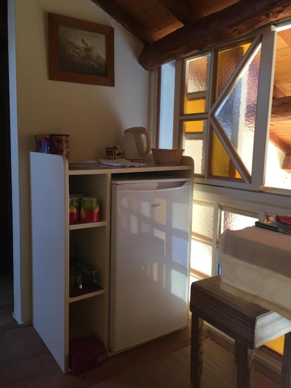 Kuchyň nebo kuchyňský kout v ubytování B&B Tra Mare e Laguna