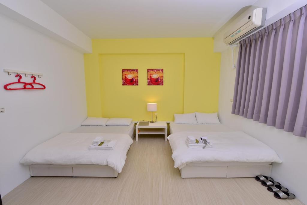 A bed or beds in a room at STSP Guest House