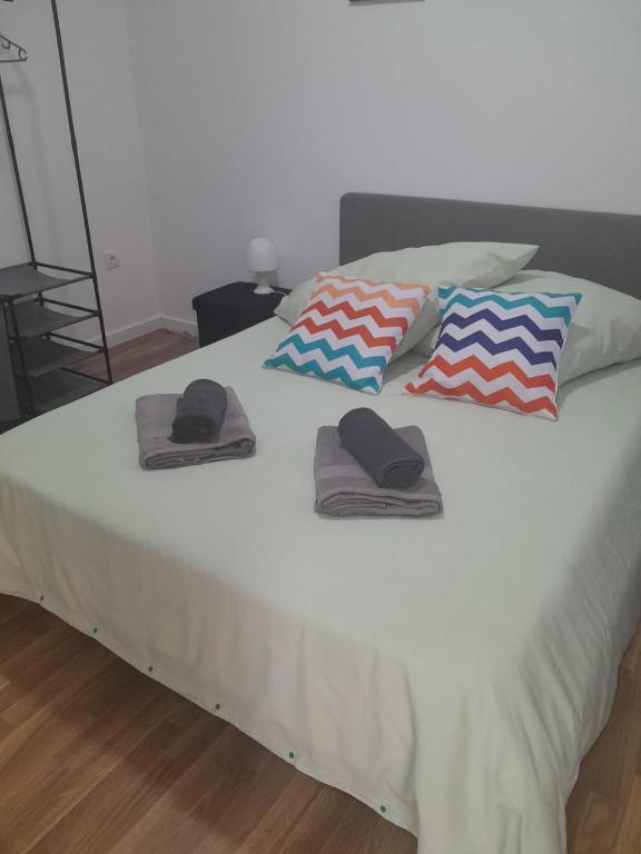 Postel nebo postele na pokoji v ubytování Sao Lourenco