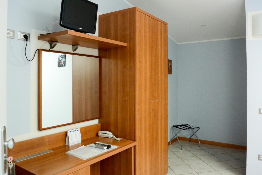 TV a/nebo společenská místnost v ubytování Albergo Meublè Abatjour