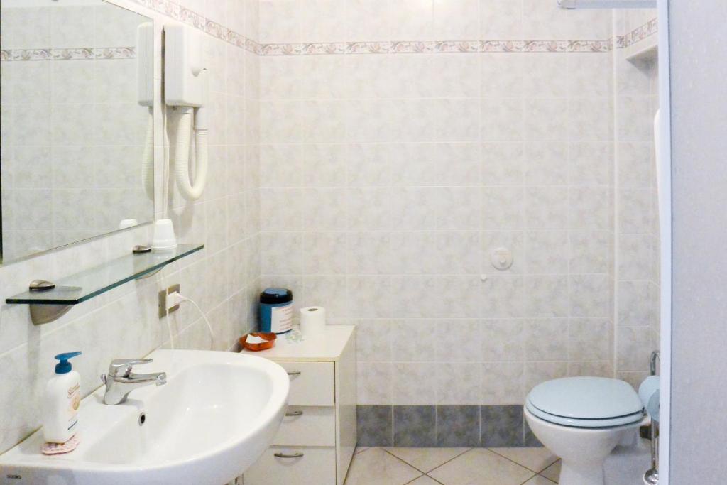 Koupelna v ubytování Albergo Meublè Abatjour