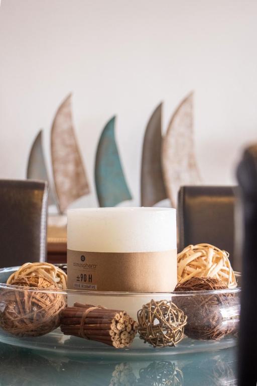 a table topped with a box and some candles at Casa Sol by Urban Beach Rentals in Portimão