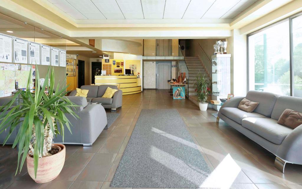 Kuchyň nebo kuchyňský kout v ubytování Dama Hotel