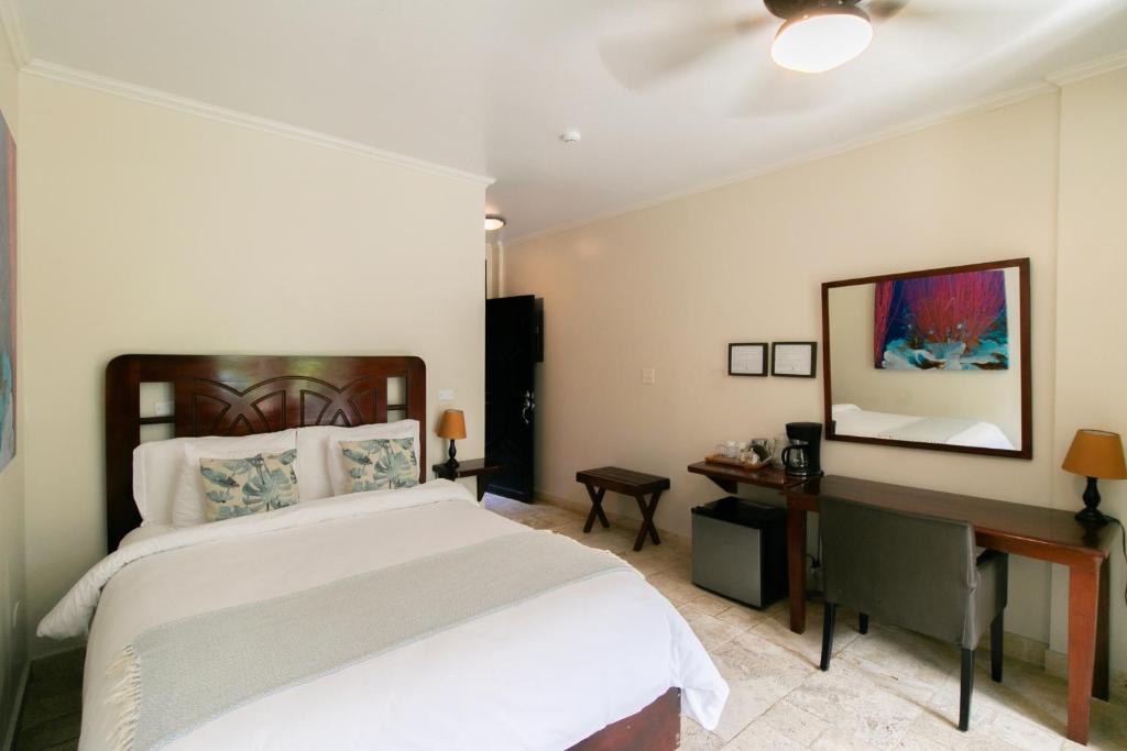 Una cama o camas en una habitación de Hotel Palma Royale
