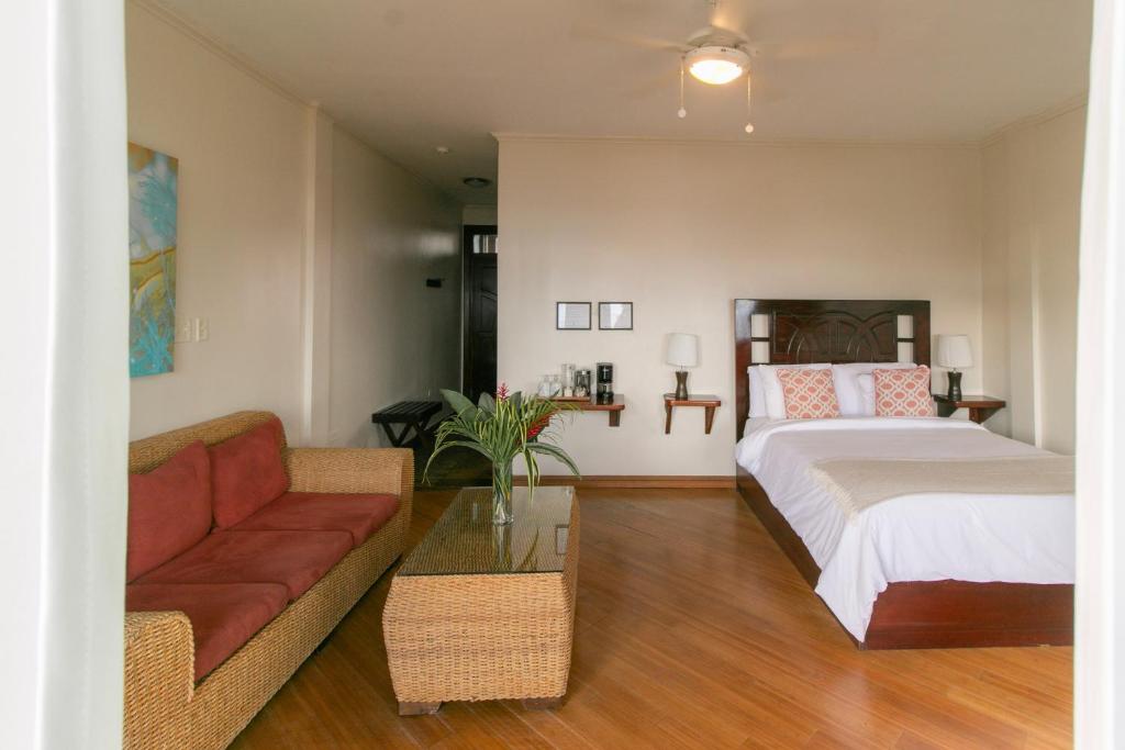 Una cama o camas en una habitación de Hotel Palma Royale