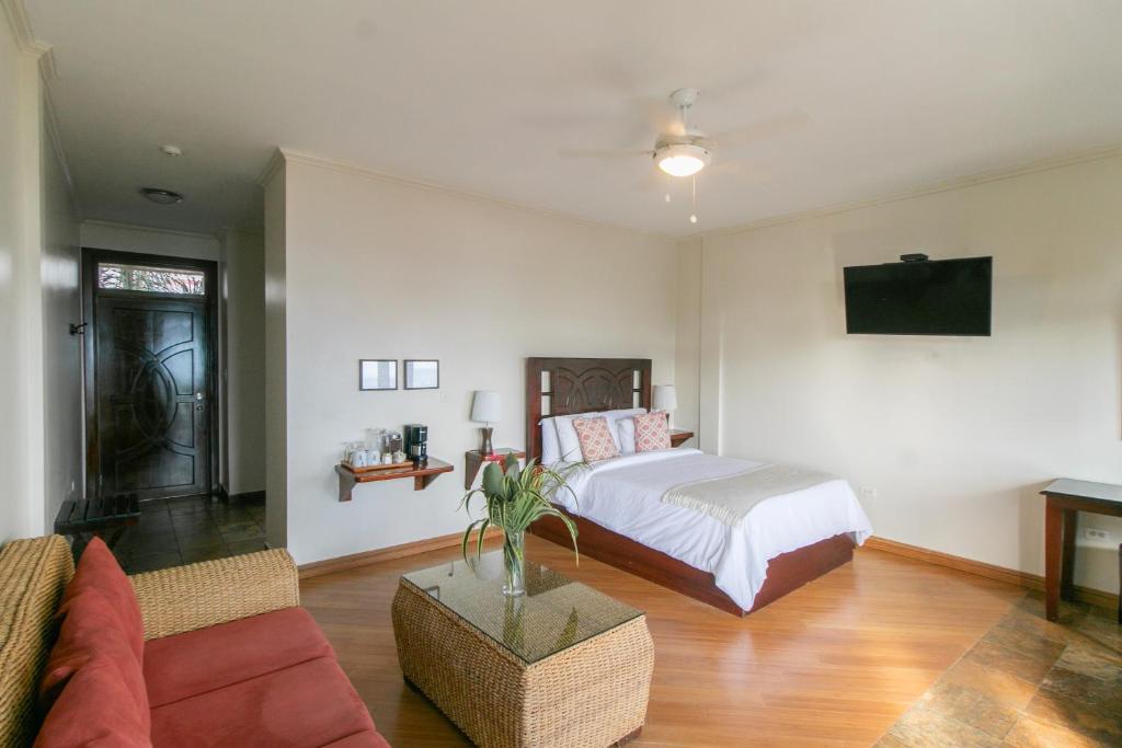 Una cama o camas en una habitación de Hotel Palma Royale