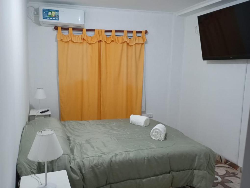 Postel nebo postele na pokoji v ubytování Departamento federación 1