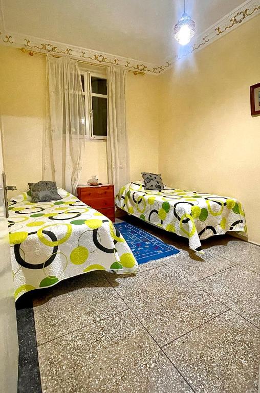 Postel nebo postele na pokoji v ubytování La casita de Larache