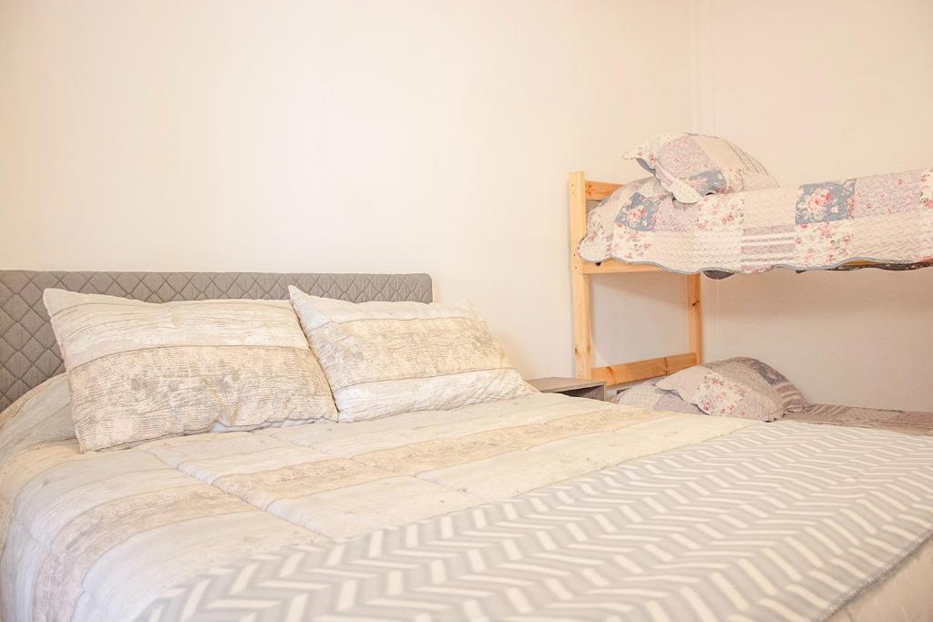 Letto o letti in una camera di Scorpius Hostel