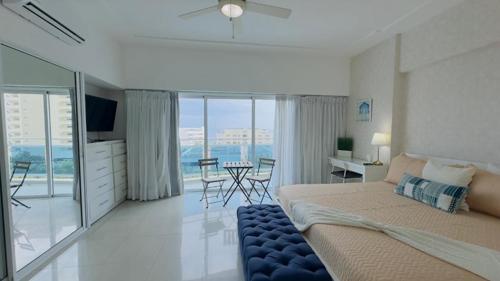 Postel nebo postele na pokoji v ubytování Elegante Aqua Marine Apartamento Juan Dolio