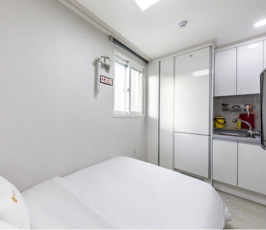 Voodi või voodid majutusasutuse JS Hostel toas