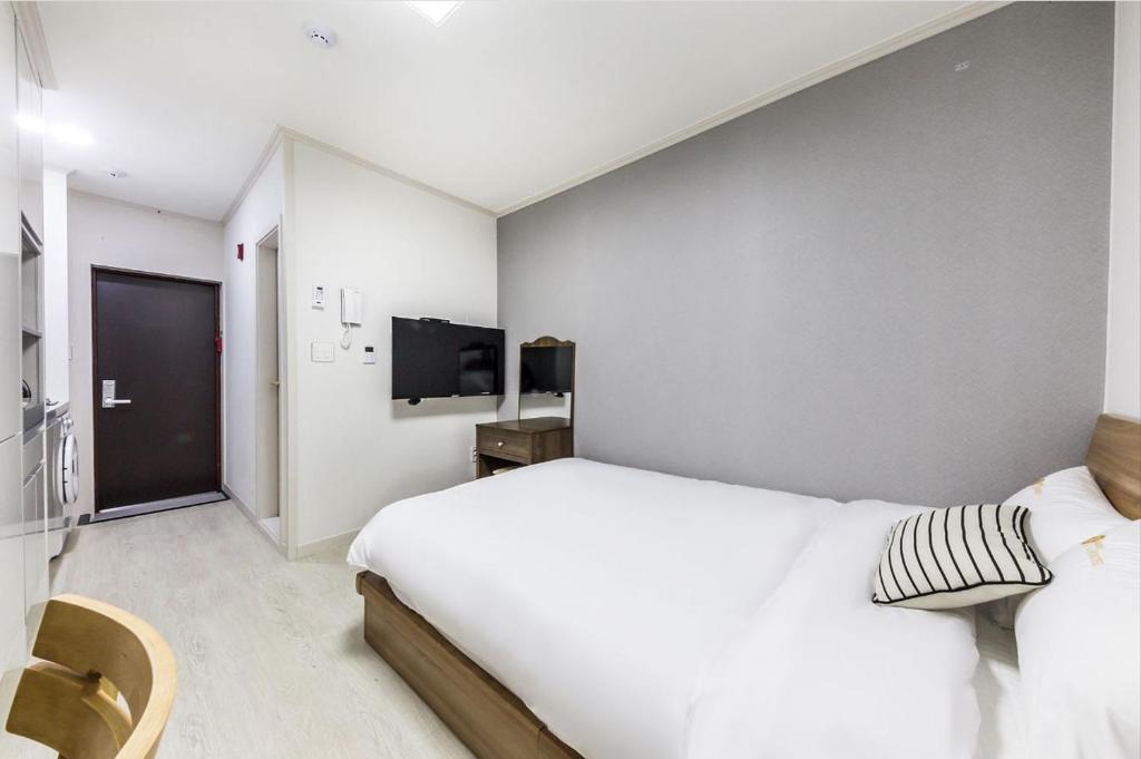 Voodi või voodid majutusasutuse JS Hostel toas