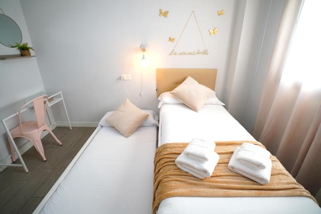 Postel nebo postele na pokoji v ubytování APARTAMENTO ARENA en Playa de San Juan