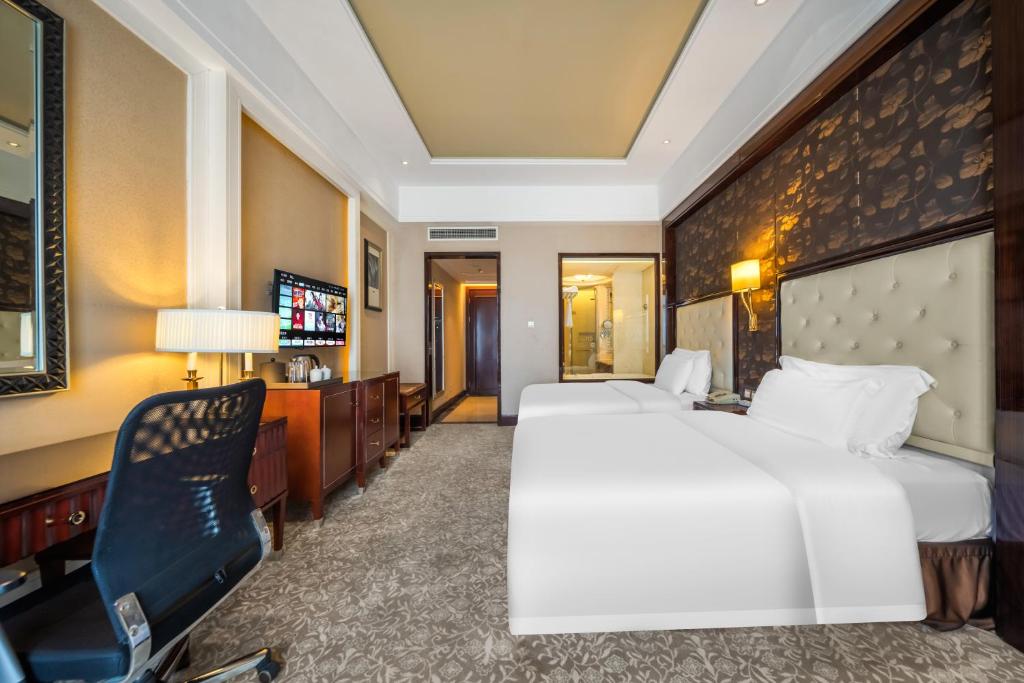 TV a/nebo společenská místnost v ubytování Wyndham Grand Plaza Royale Palace Chengdu
