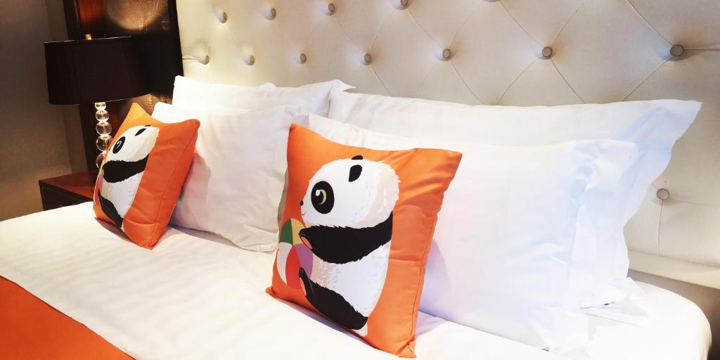 Postel nebo postele na pokoji v ubytování Wyndham Grand Plaza Royale Palace Chengdu