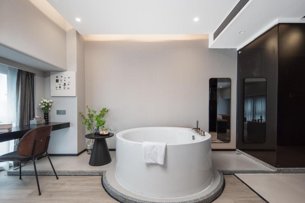 Posezení v ubytování LlA Hotel Liang Jun Plaza, Xixiang Avenue