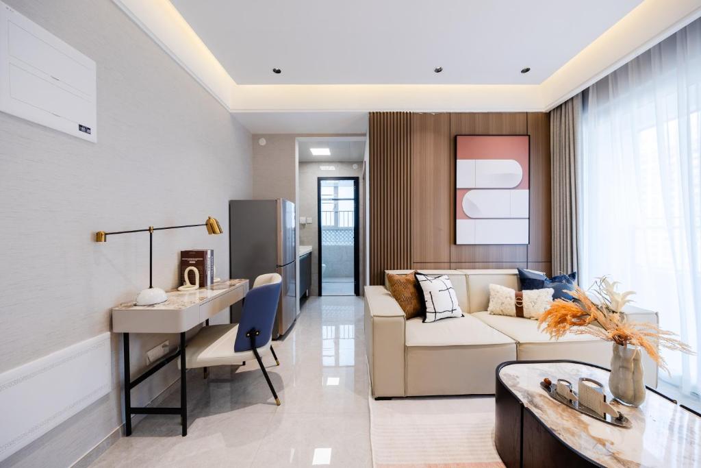 Posezení v ubytování Shenzhen Gangxiahui Executive Apartment Futian Convention and Exhibition Center Branch