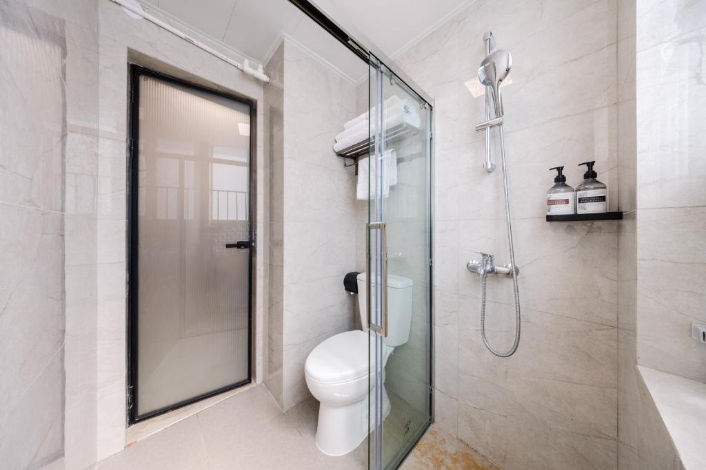 Koupelna v ubytování Shenzhen Gangxiahui Executive Apartment Futian Convention and Exhibition Center Branch