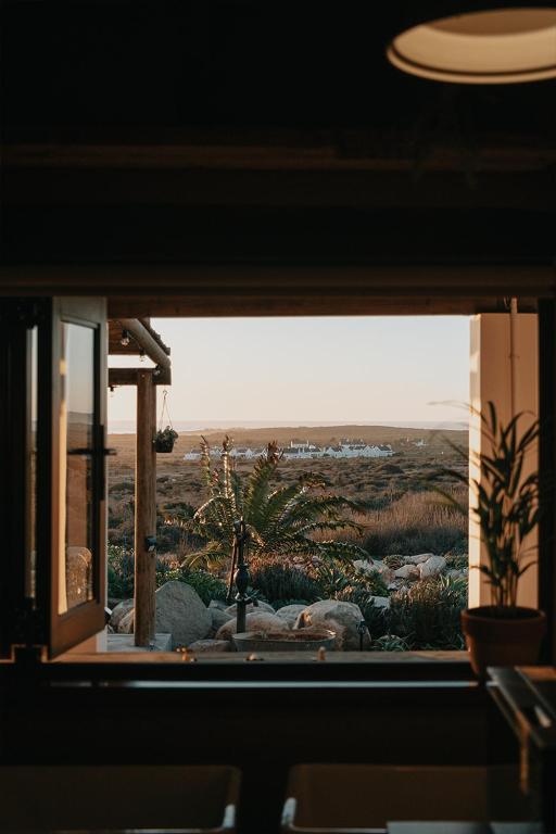 a view of a desert from a window at DagDromer Holiday Home in Jacobs Bay