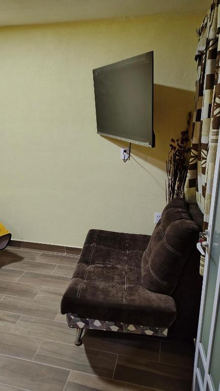 TV a/nebo společenská místnost v ubytování Posada Tres Marías Un rincón de Magia Zacateca.