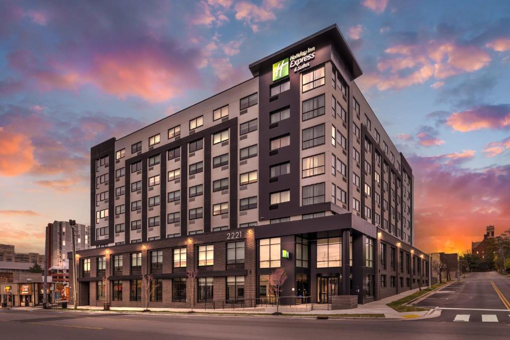 a rendering of a building with a sunset at Holiday Inn Express & Suites Nashville West End - Univ Area by IHG in Nashville