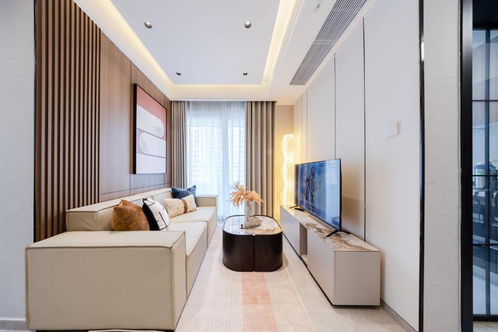 Posezení v ubytování Shenzhen Gangxiahui Executive Apartment Futian Convention and Exhibition Center Branch