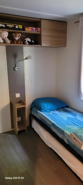Postel nebo postele na pokoji v ubytování FMLODGE-mobilhome olivier