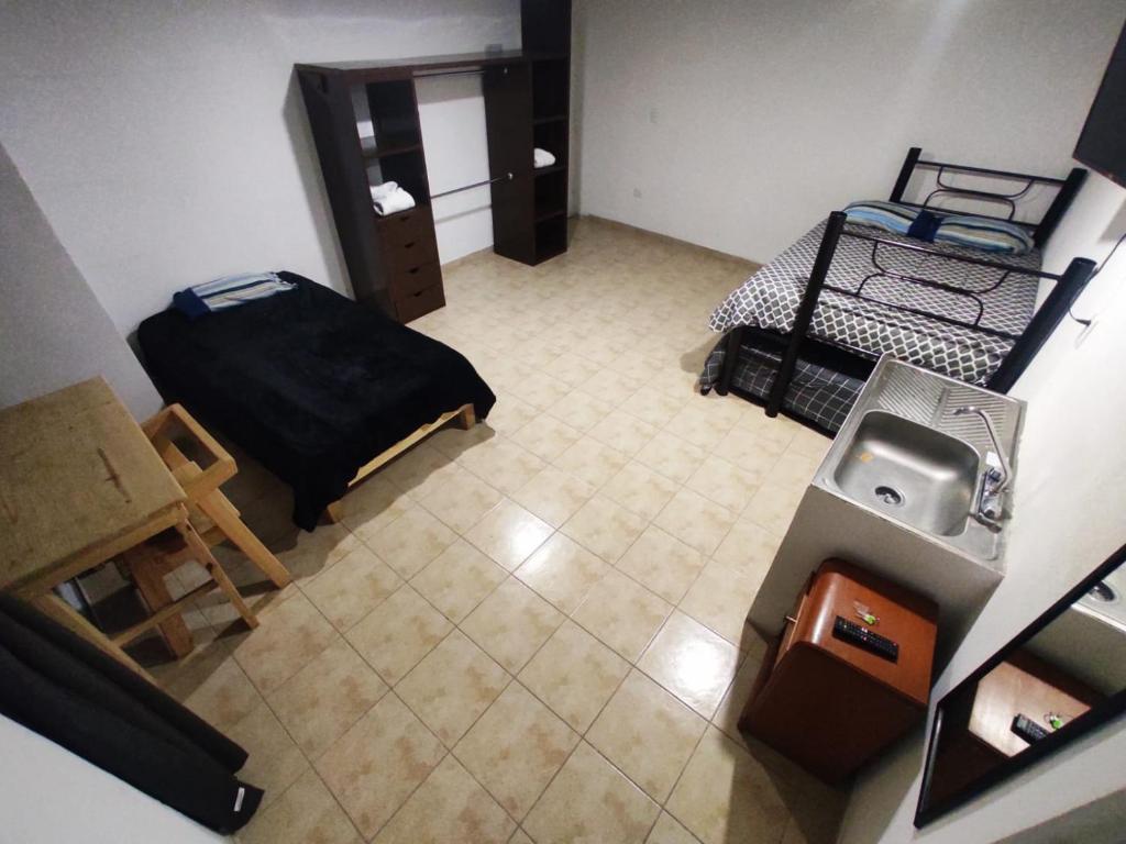 Letto o letti in una camera di Hotelito Ejido San Ale