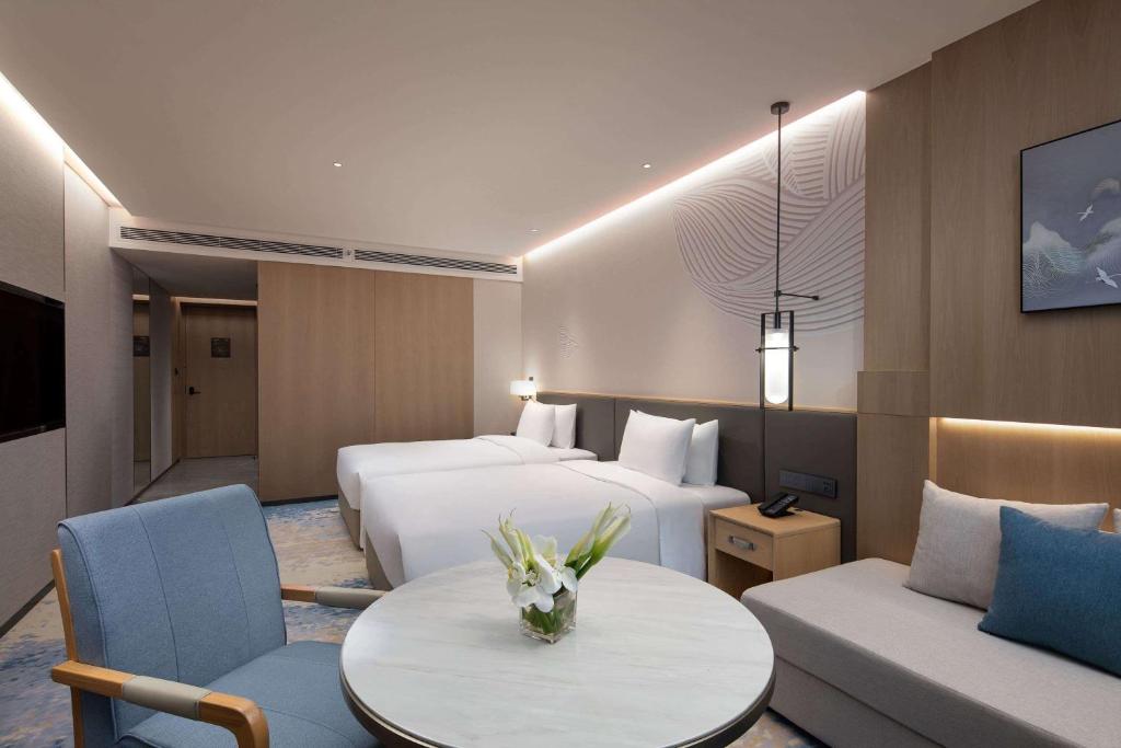 Posezení v ubytování Wyndham Hotel Guangzhou Huangbian Metro Branch - Free shuttle bus to Canton Fair