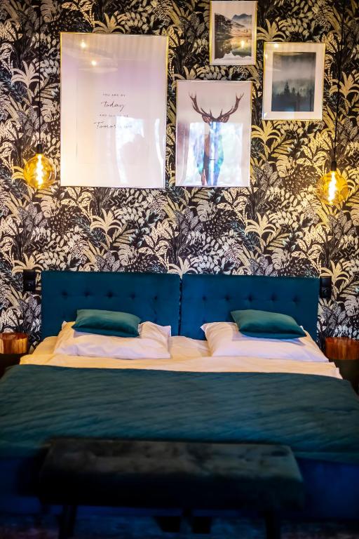 Postel nebo postele na pokoji v ubytování Hotel Bacówka Radawa & SPA