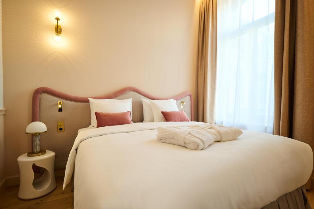 Postel nebo postele na pokoji v ubytování Les Bains de Spa